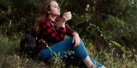 full-shot-woman-sitting-ground-forest_23-2148637099 - Городская Газета